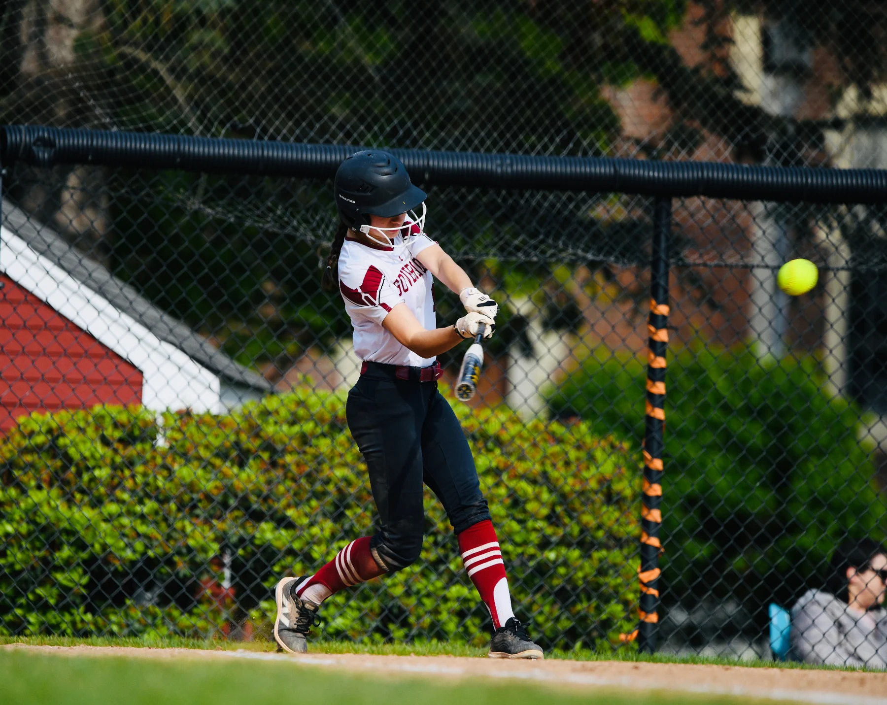 Ella Moskal making contact at the plate for The Governor's Academy